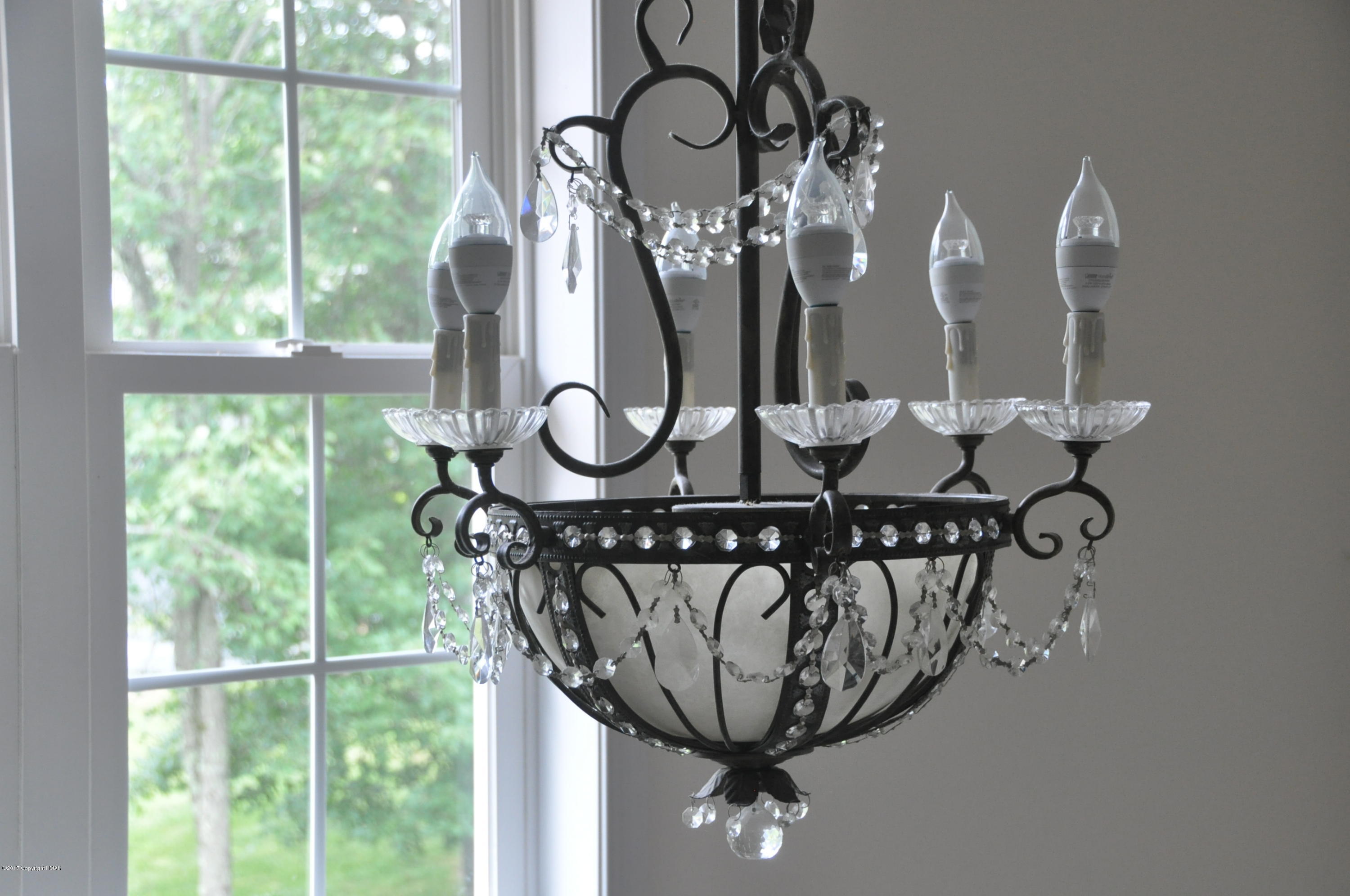 167 Sawmill Road Long Pond, PA 18334 - Photo 36 of 38 a view of a dining room with furniture chandelier and mountain view