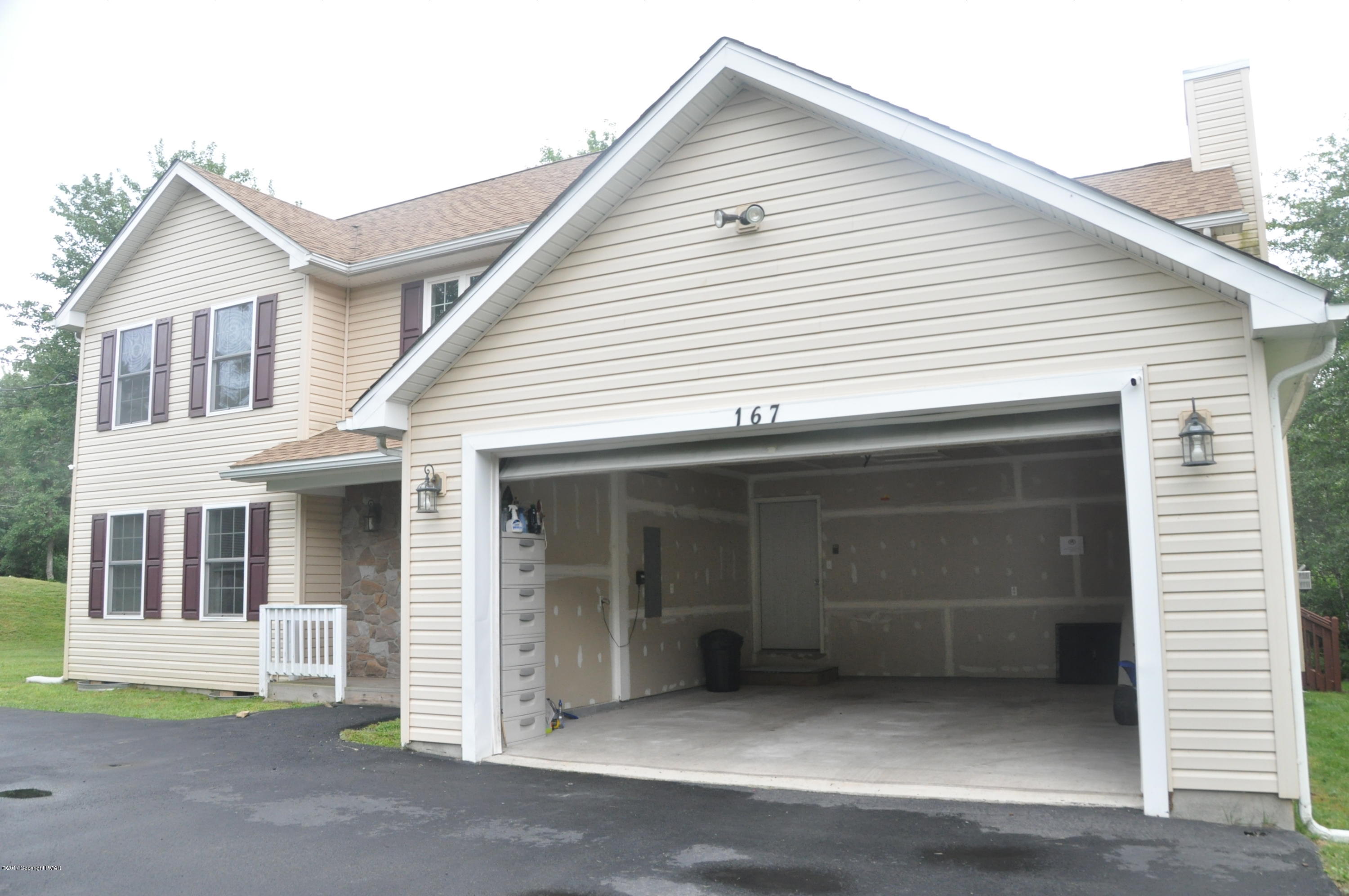 167 Sawmill Road Long Pond, PA 18334 - Photo 4 of 38 a front view of a house