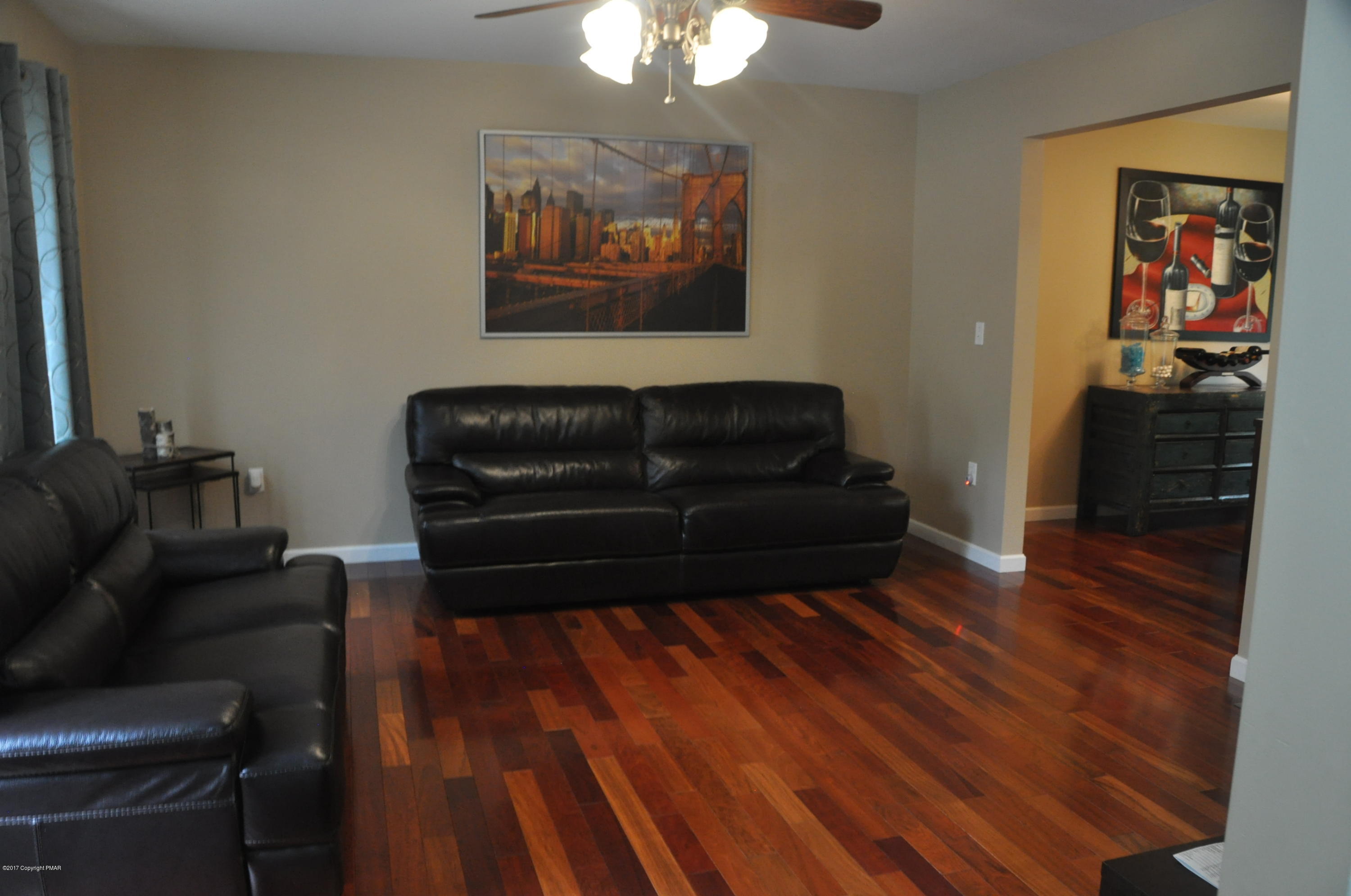 167 Sawmill Road Long Pond, PA 18334 - Photo 6 of 38 a living room with furniture and wooden floor
