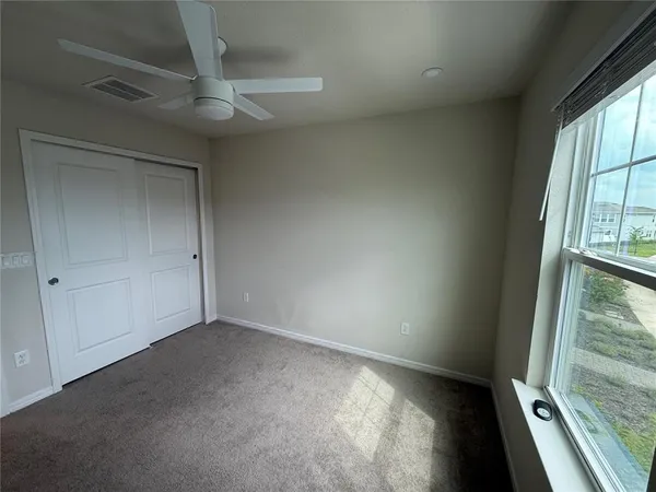 a view of a swimming pool with an ocean view