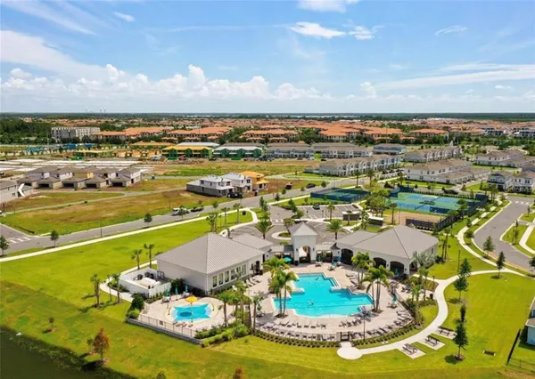 an aerial view of a house with outdoor space