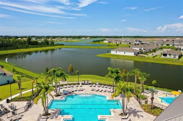 a view of a swimming pool and an ocean view
