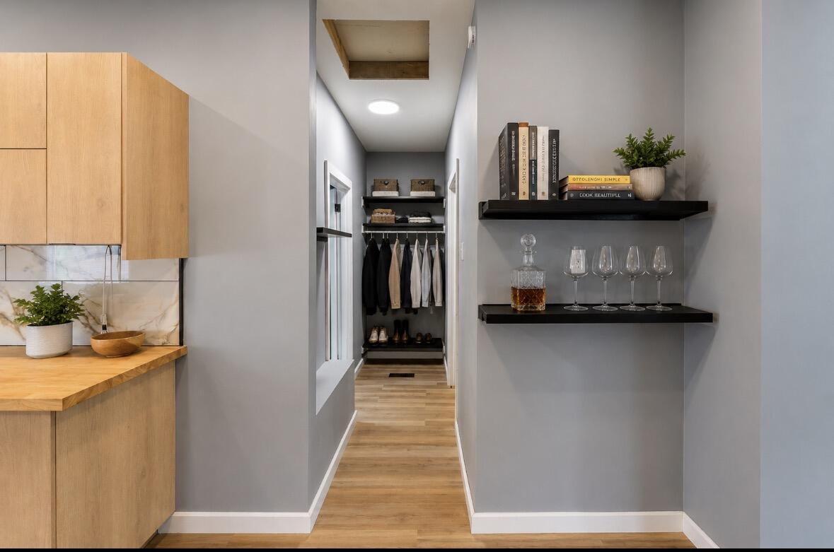 1317 Harrison Street Gary, IN 46407 - Photo 17 of 40 a hallway with storage and utility