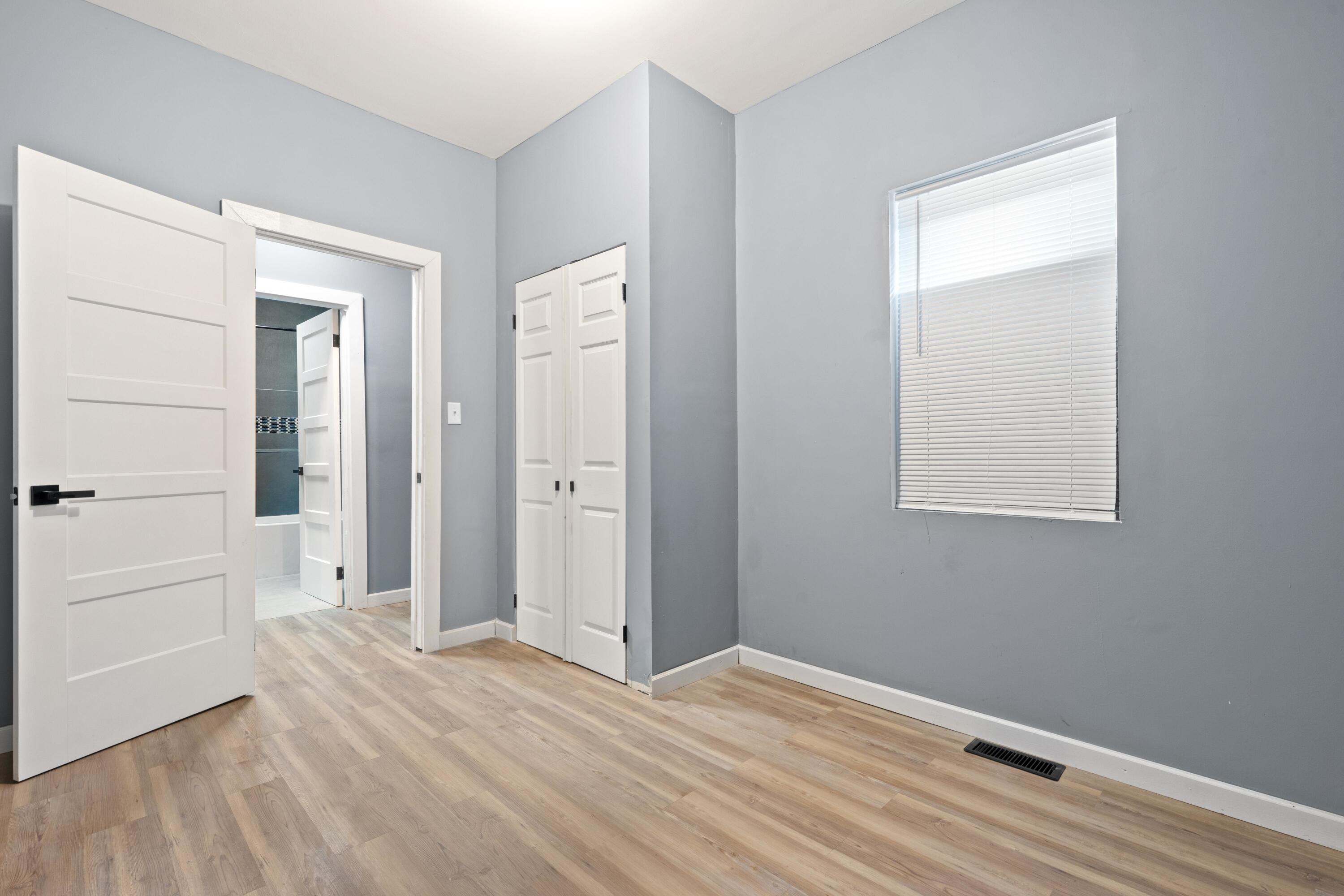 1317 Harrison Street Gary, IN 46407 - Photo 25 of 40 a view of empty room with wooden floor