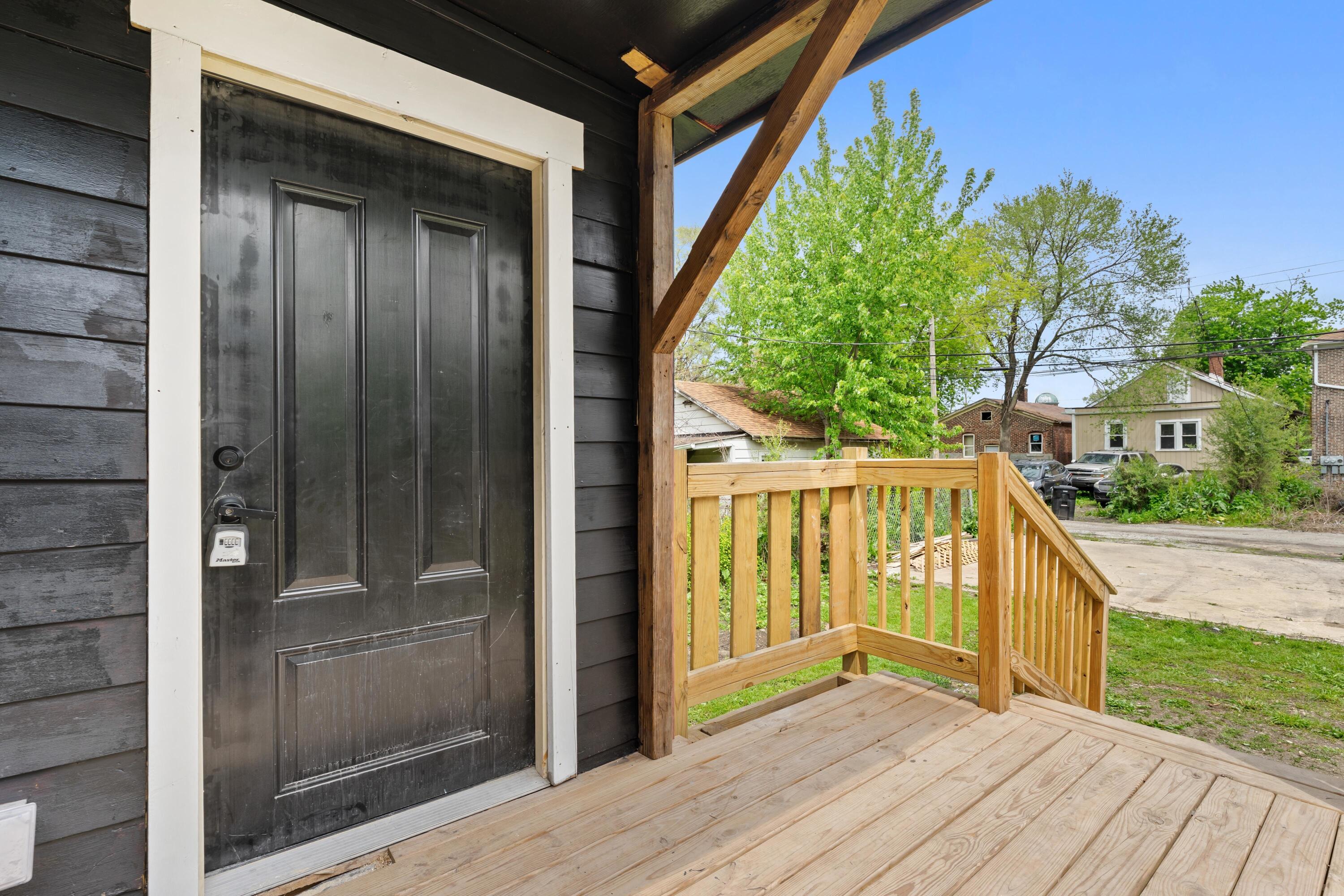 1317 Harrison Street Gary, IN 46407 - Photo 39 of 40 a view of a house with a porch