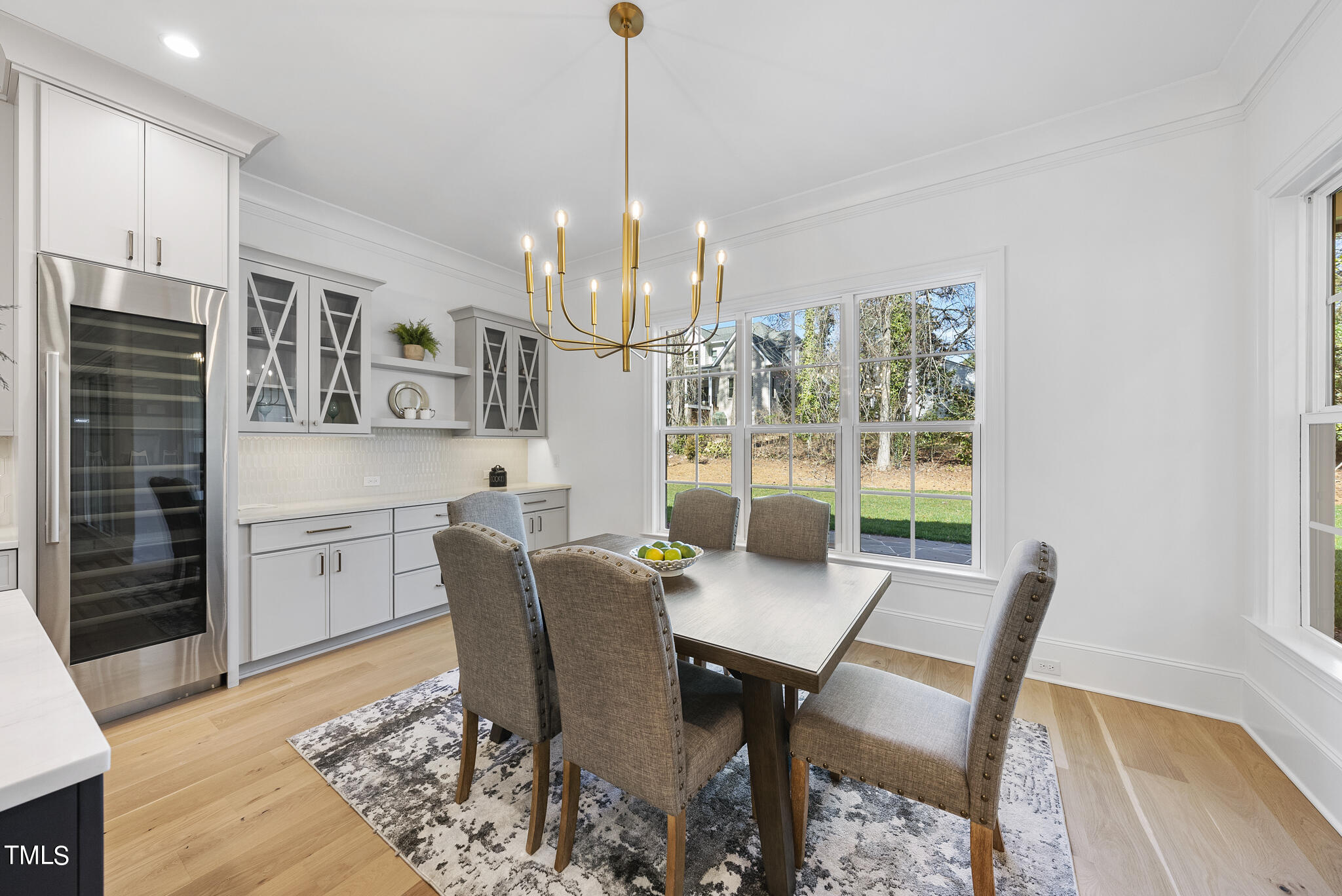 3428 Leonard Street Raleigh, NC 27607 - Photo 15 of 49 a view of a dining room with furniture window and wooden floor