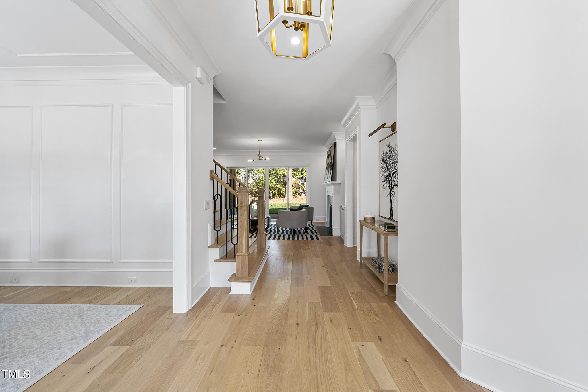 3428 Leonard Street Raleigh, NC 27607 - Photo 2 of 49 a view of a living room hardwood floor and a kitchen