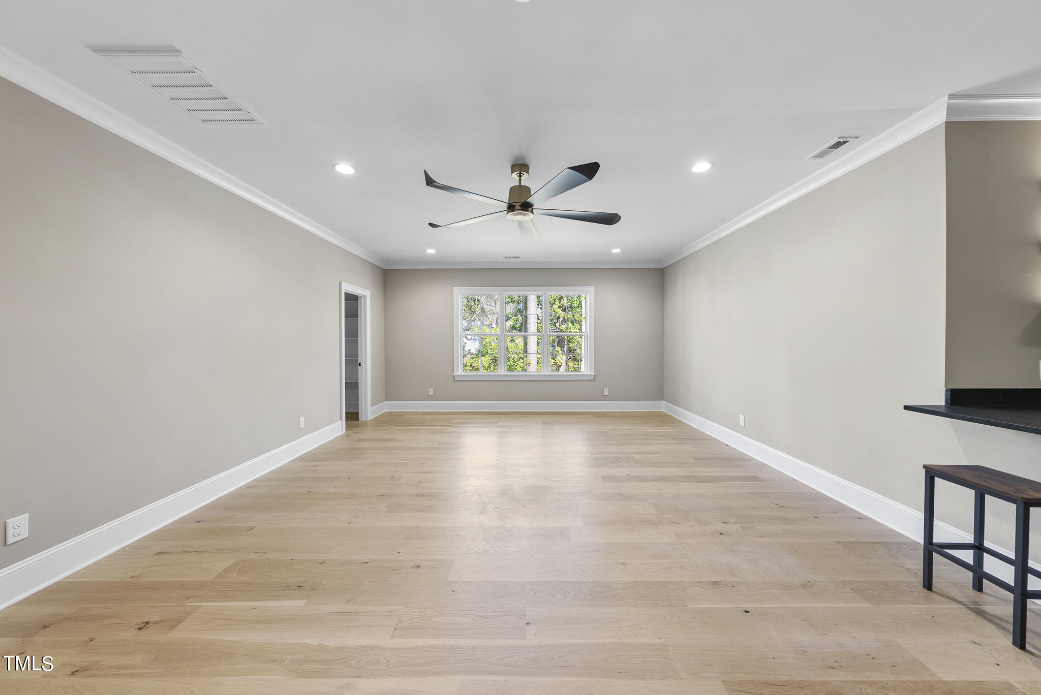 3428 Leonard Street Raleigh, NC 27607 - Photo 28 of 49 an empty room with windows and ceiling fan