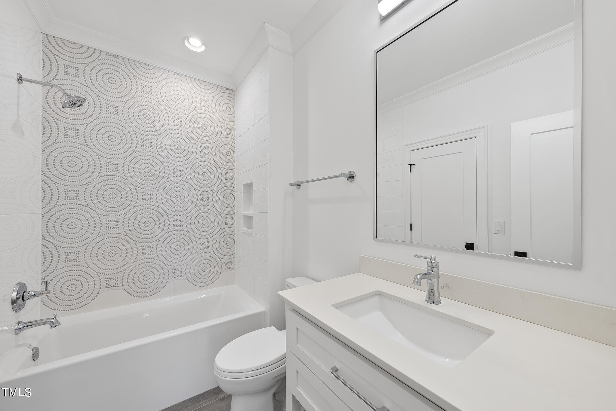 3428 Leonard Street Raleigh, NC 27607 - Photo 35 of 49 a bathroom with a sink a toilet and a bathtub