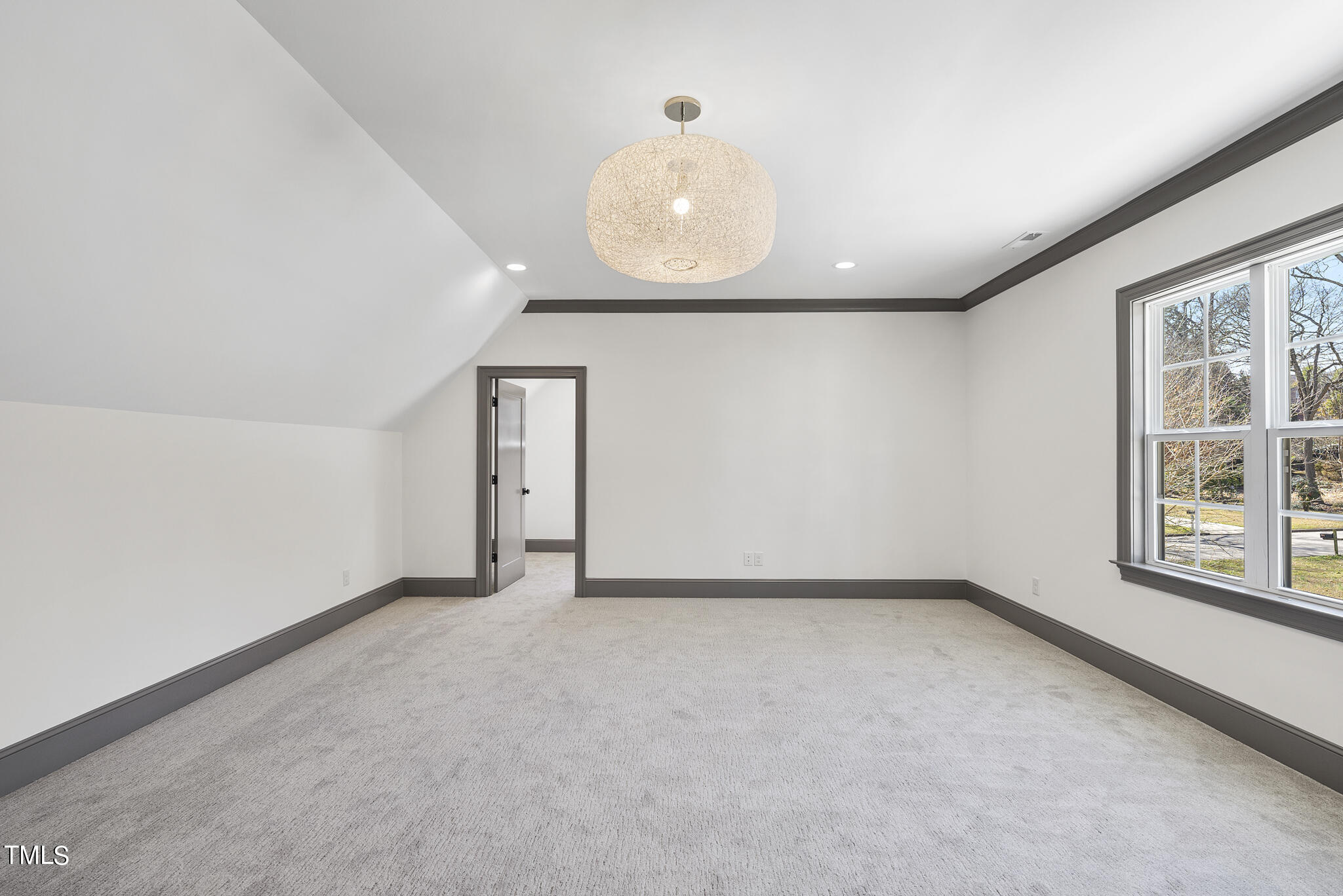 3428 Leonard Street Raleigh, NC 27607 - Photo 40 of 49 an empty room with windows