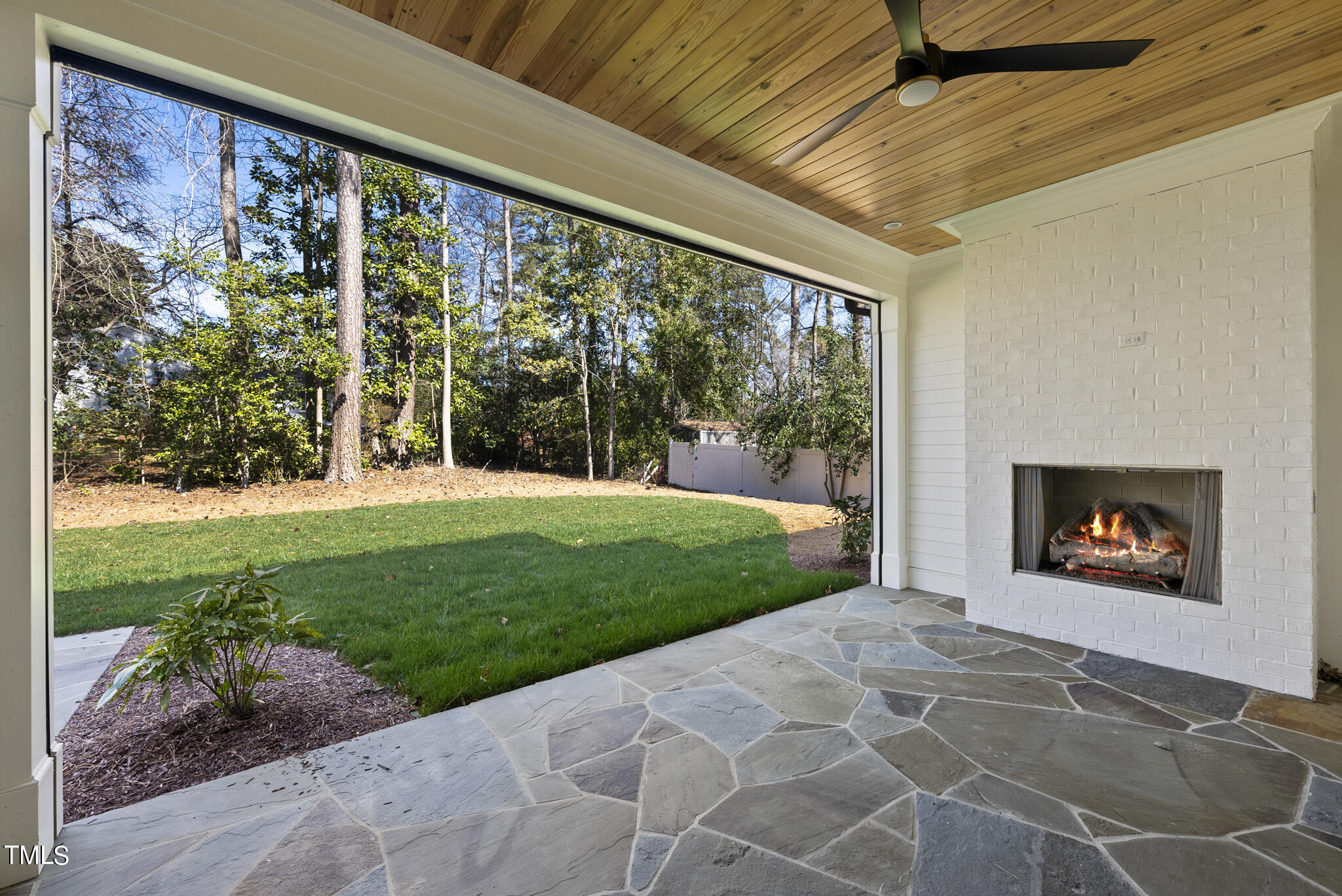 3428 Leonard Street Raleigh, NC 27607 - Photo 45 of 49 a view of a porch with a yard