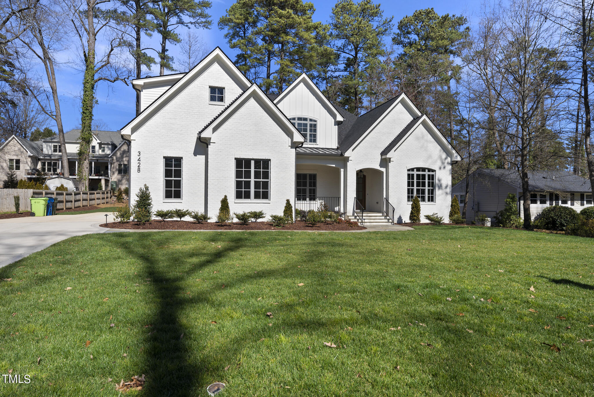 3428 Leonard Street Raleigh, NC 27607 - Photo 49 of 49 a front view of house with yard and green space