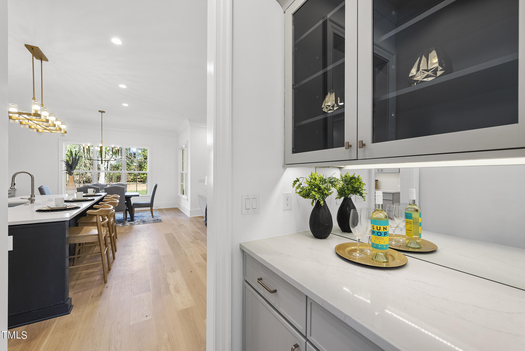 3428 Leonard Street Raleigh, NC 27607 - Photo 5 of 49 a kitchen with a sink and appliances