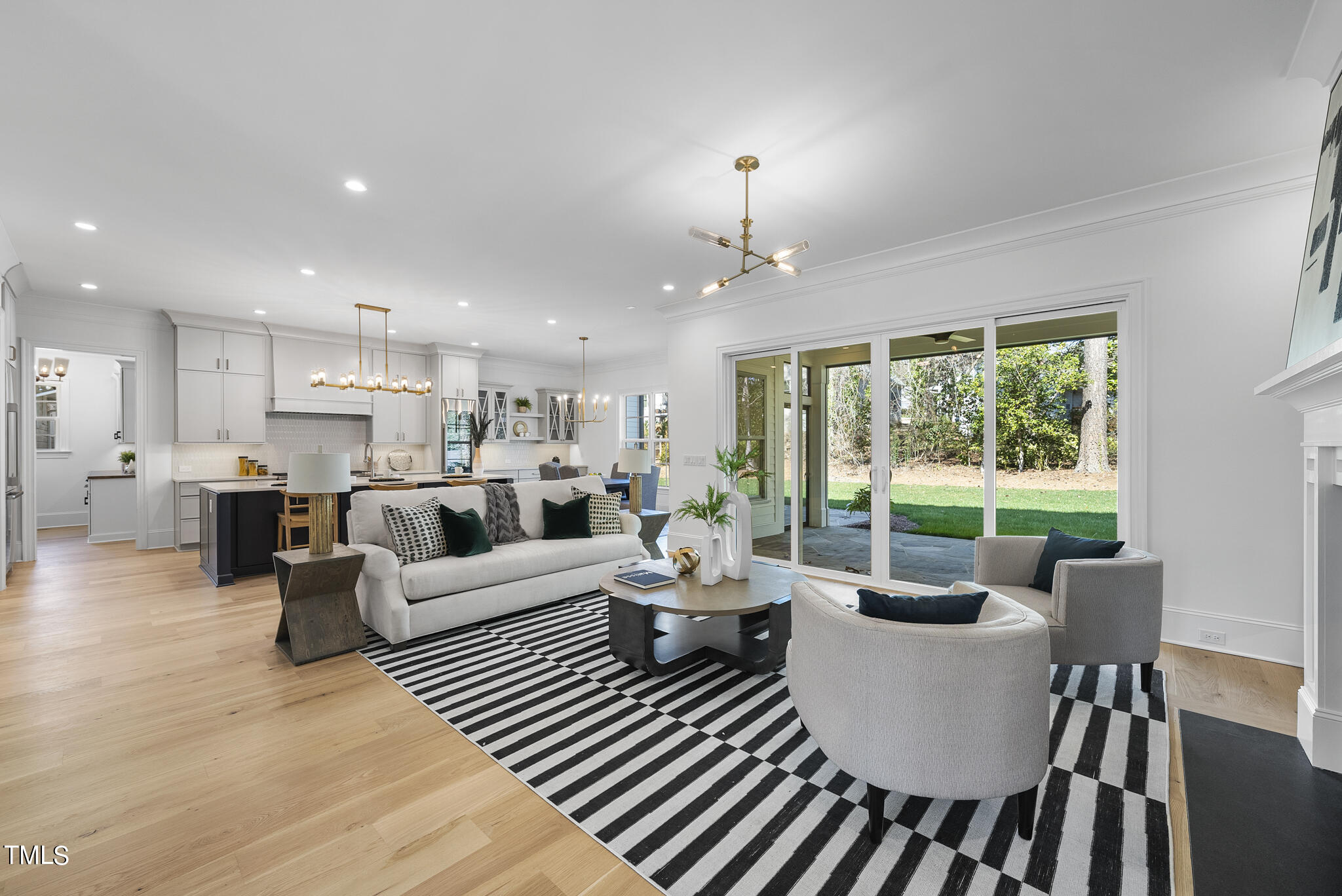 3428 Leonard Street Raleigh, NC 27607 - Photo 9 of 49 a living room with furniture and a large window