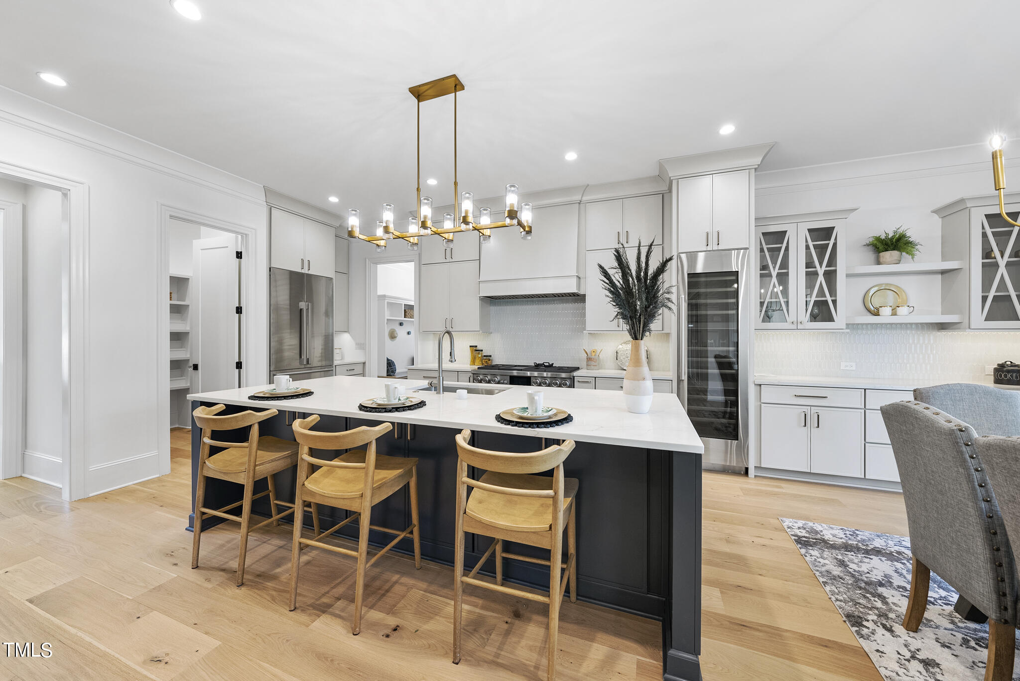 3428 Leonard Street Raleigh, NC 27607 - Photo 10 of 49 a dining hall with stainless steel appliances kitchen island granite countertop furniture and a view of kitchen