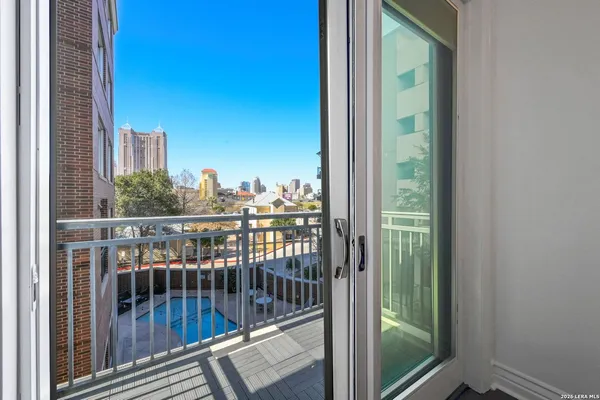 a view of a balcony with city view