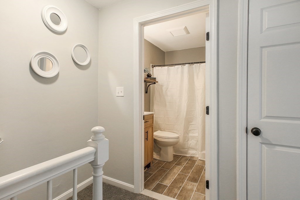151 Harkness Road, Unit B North Smithfield, RI 02896 - Photo 29 of 36 a bathroom with a toilet and a shower