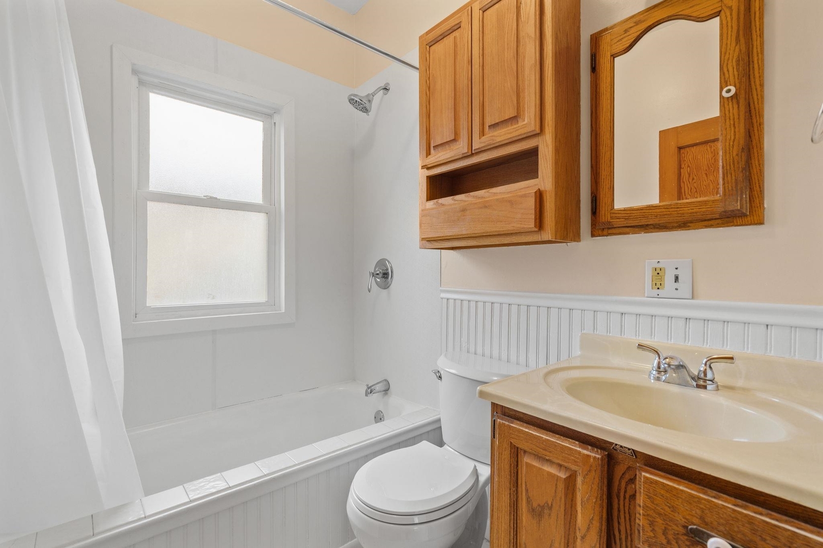 2327 6th Street Moline, IL 61265 - Photo 18 of 22 a bathroom with a sink toilet vanity and bathtub