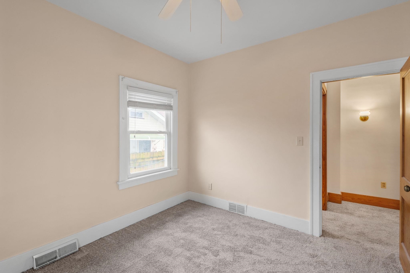 2327 6th Street Moline, IL 61265 - Photo 19 of 22 an empty room with windows