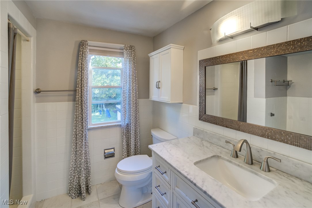 4532 Mackall Road South Euclid, OH 44121 - Photo 25 of 35 Newer hall bath with tub and shower