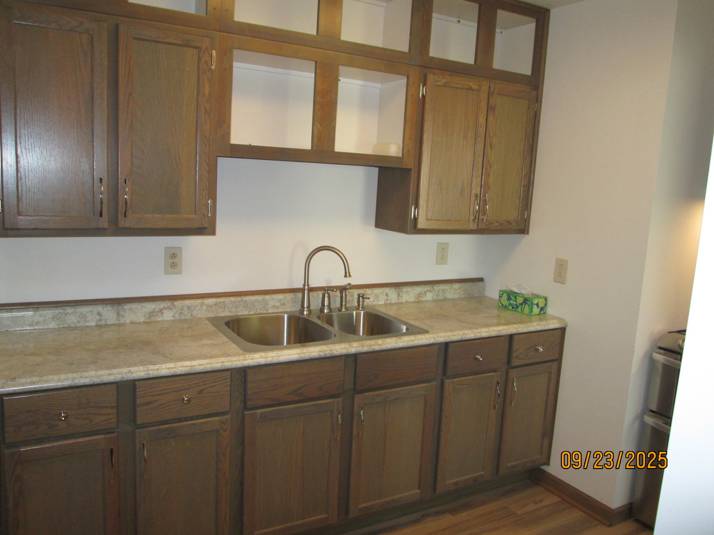 1806 Dallas Place Joliet, IL 60433 - Photo 7 of 13 a kitchen with a sink and cabinets