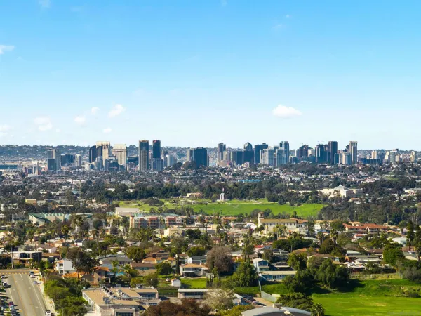 a view of a city with tall buildings