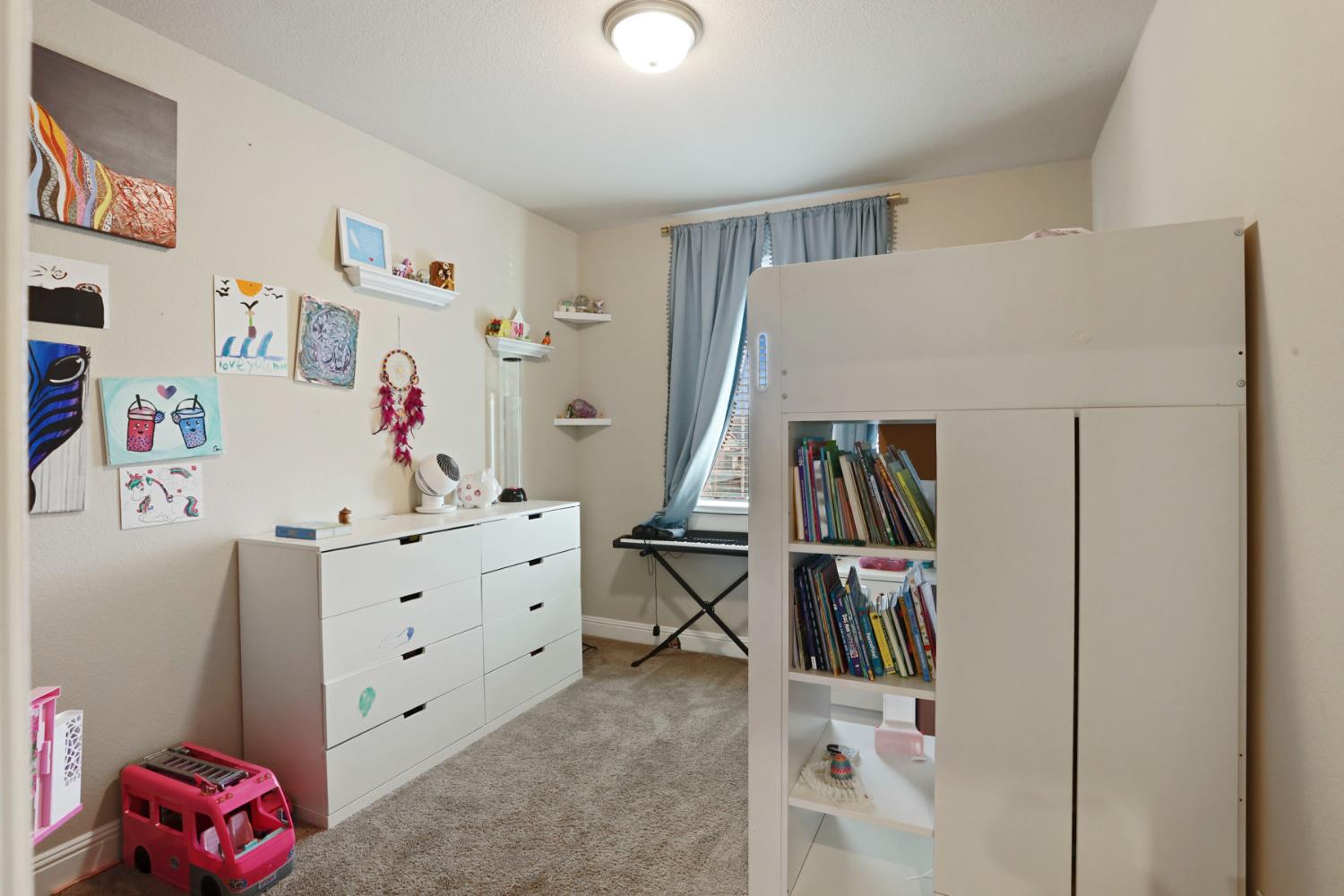 2905 Zinnia Way Lodi, CA 95242 - Photo 25 of 47 a view of room with guitars and closet