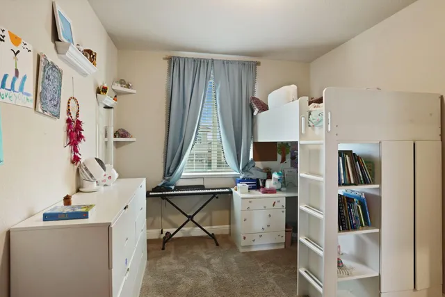 a bathroom with a shower sink and mirror