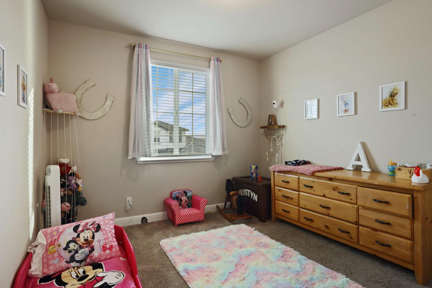 2905 Zinnia Way Lodi, CA 95242 - Photo 27 of 47 a bedroom with a bed dresser and a window