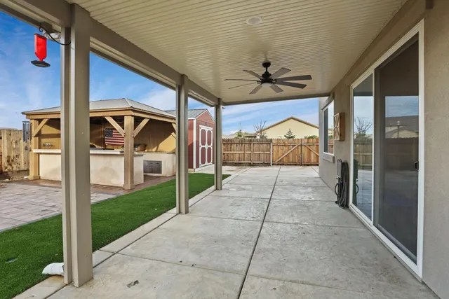 a view of a terrace with sitting area