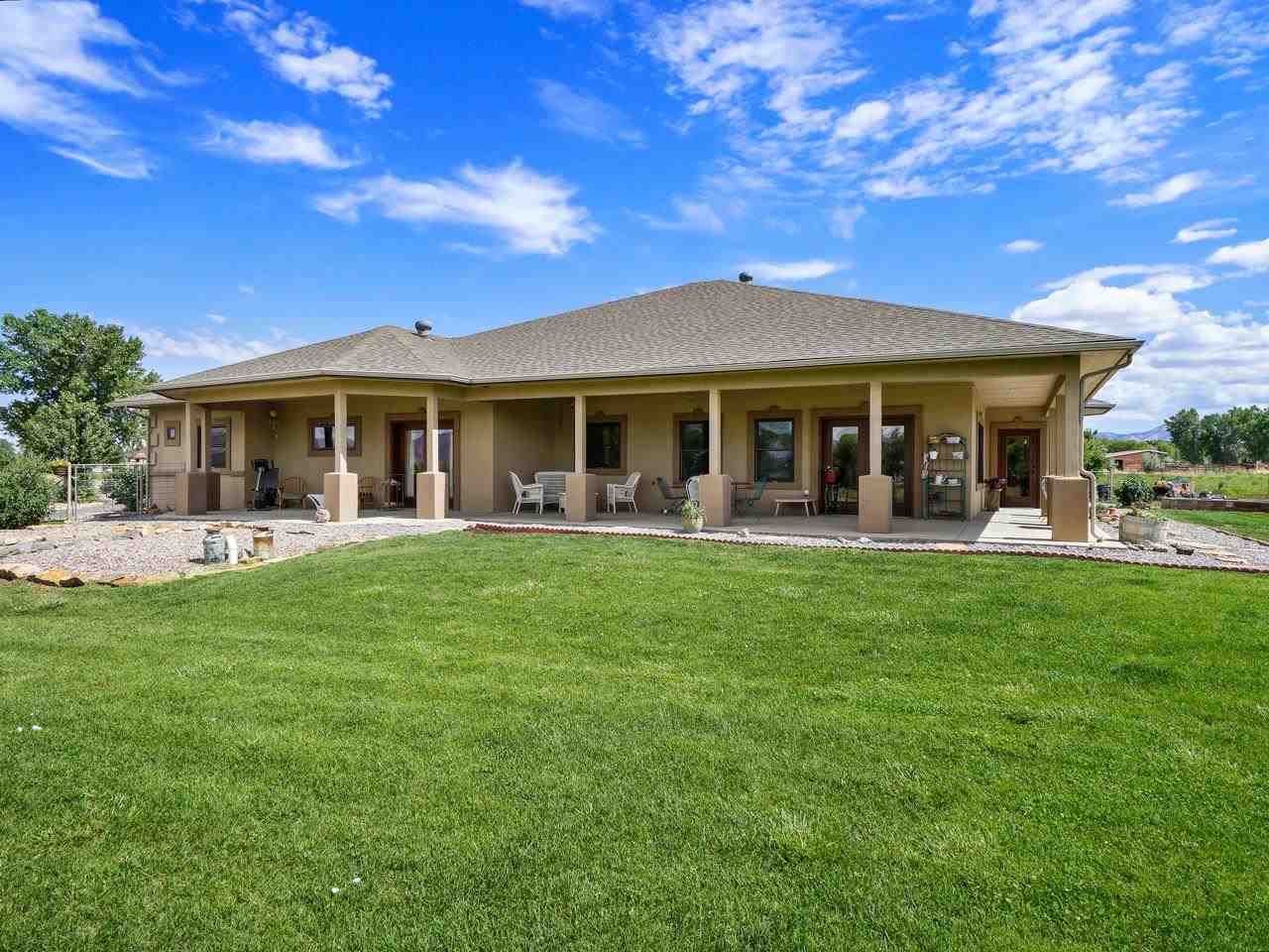 912 23 Road Grand Junction, CO 81505 - Photo 1 of 42 a view of a house with a backyard