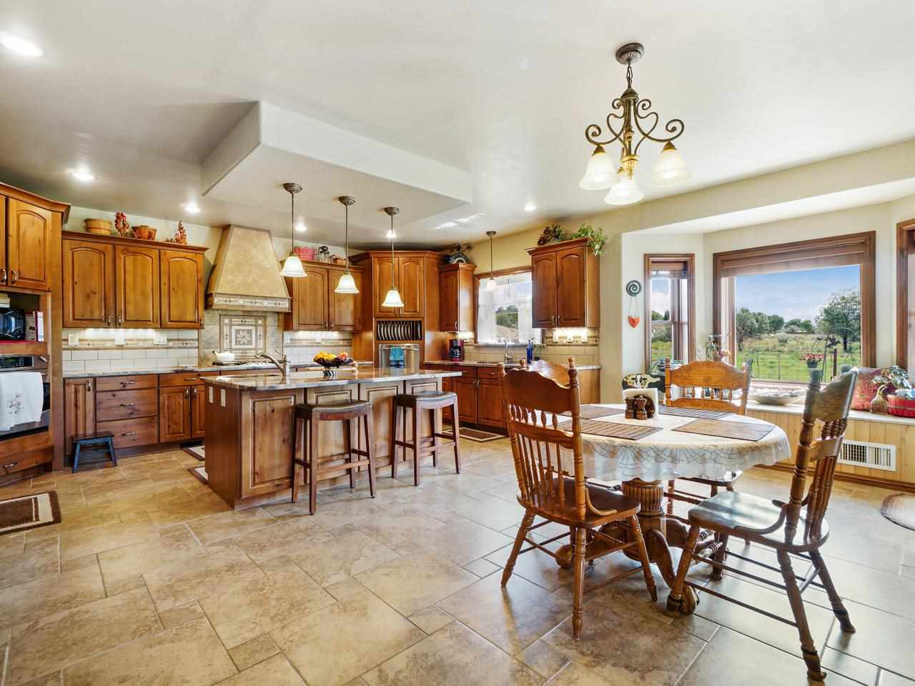 912 23 Road Grand Junction, CO 81505 - Photo 16 of 42 a view of a dining area with furniture