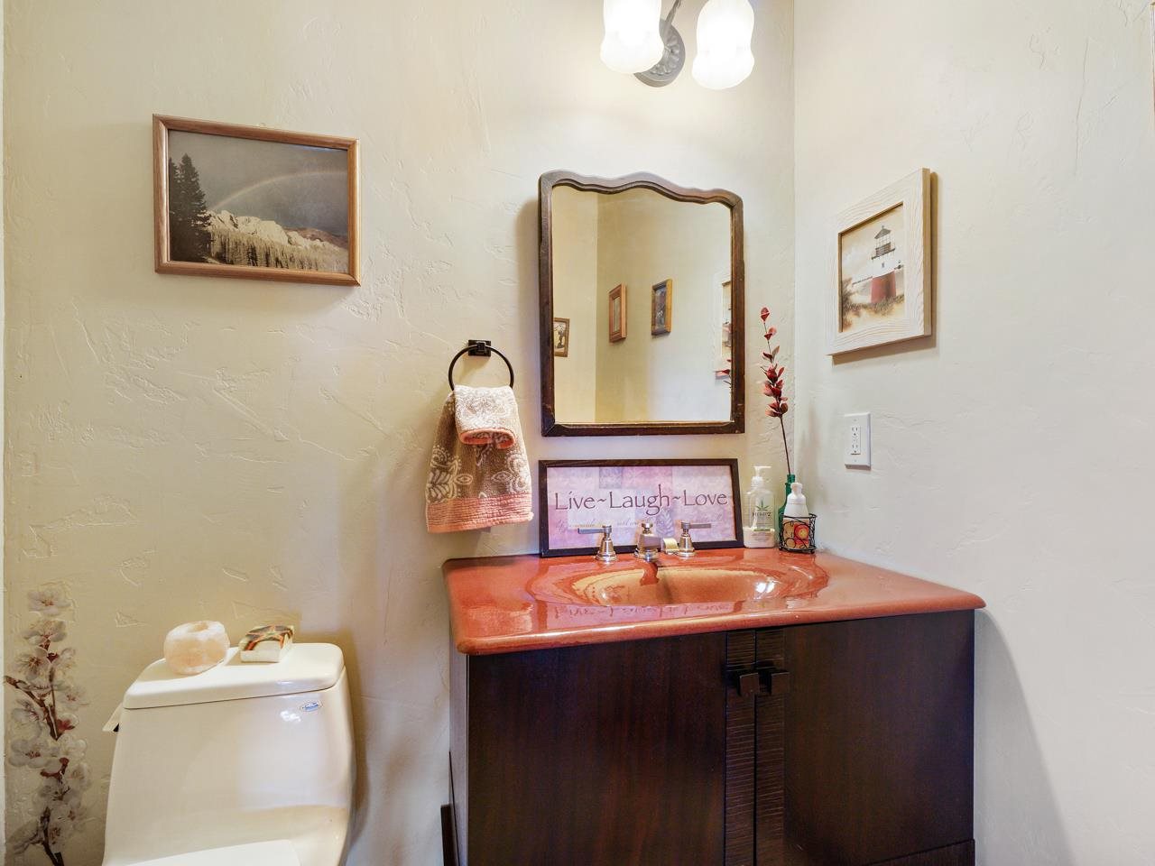 912 23 Road Grand Junction, CO 81505 - Photo 32 of 42 a bathroom with a sink mirror and toilet
