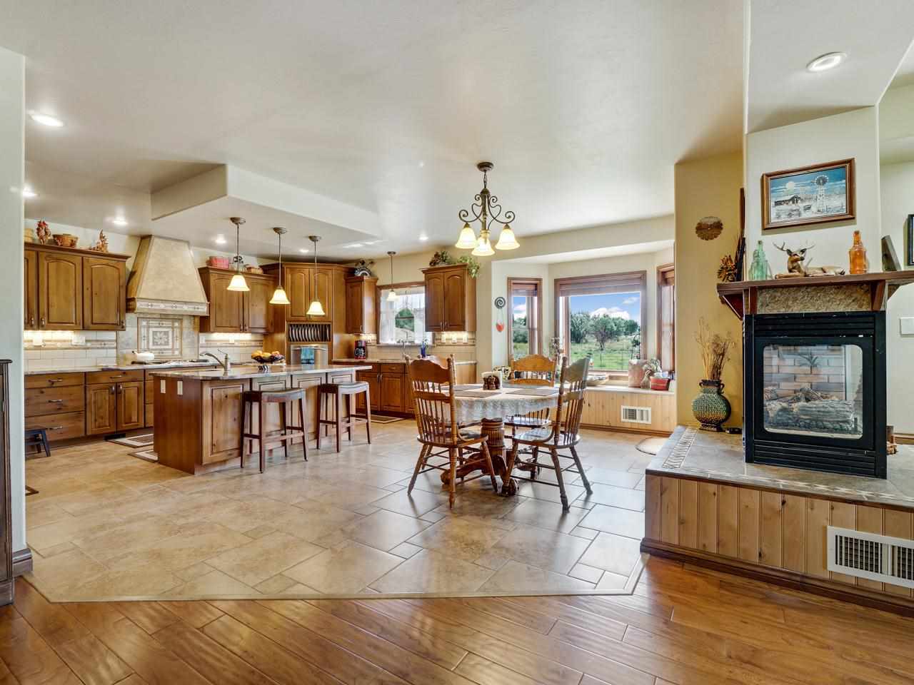 912 23 Road Grand Junction, CO 81505 - Photo 41 of 42 a living room with fireplace furniture and a large window