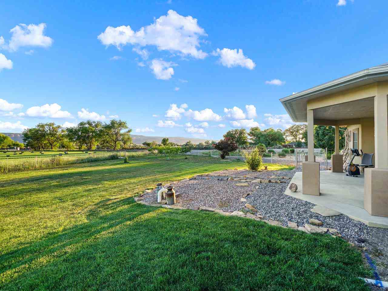 912 23 Road Grand Junction, CO 81505 - Photo 5 of 42 a view of a golf course with a swimming pool