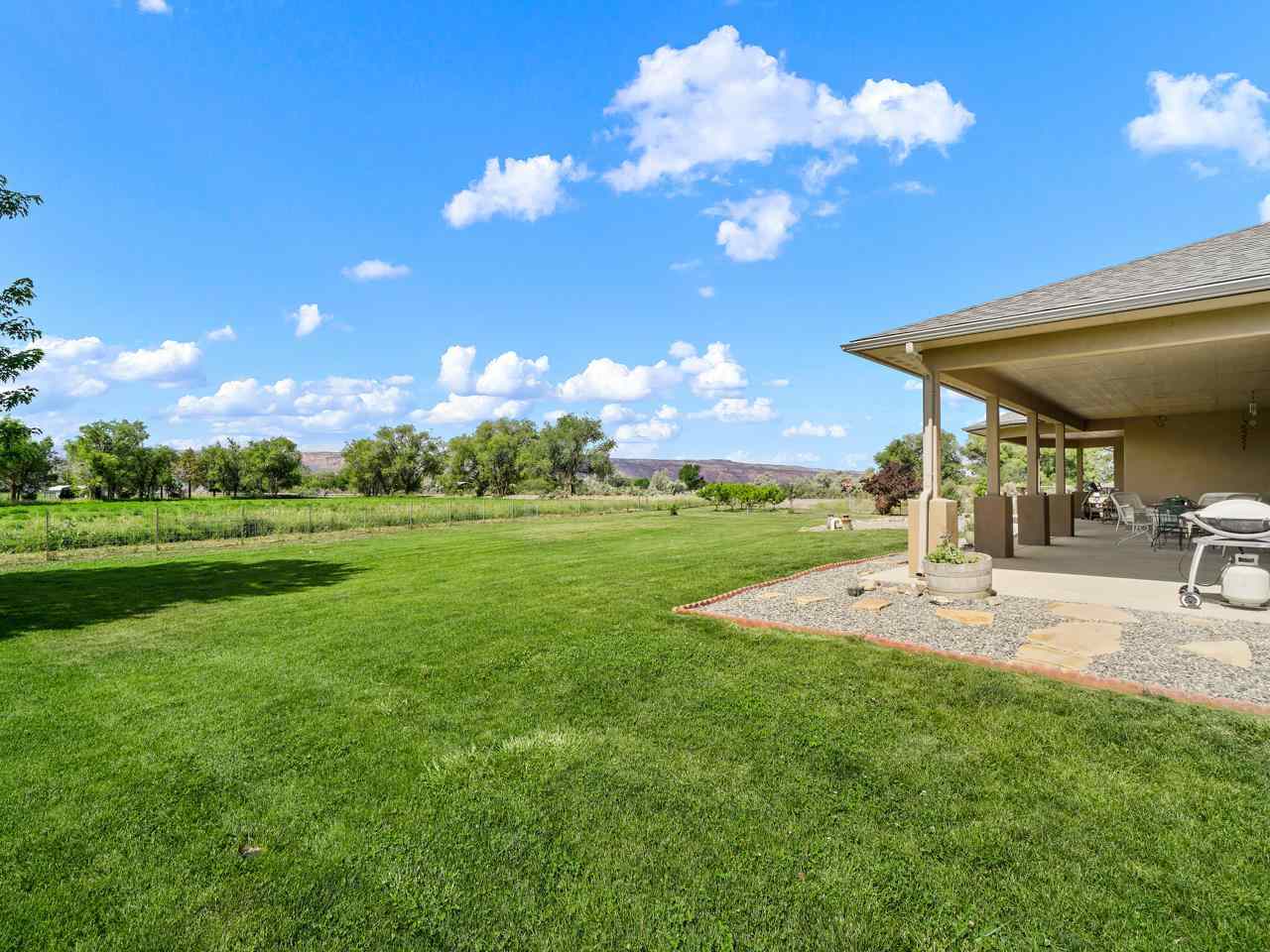 912 23 Road Grand Junction, CO 81505 - Photo 8 of 42 a view of a playground ground and garden