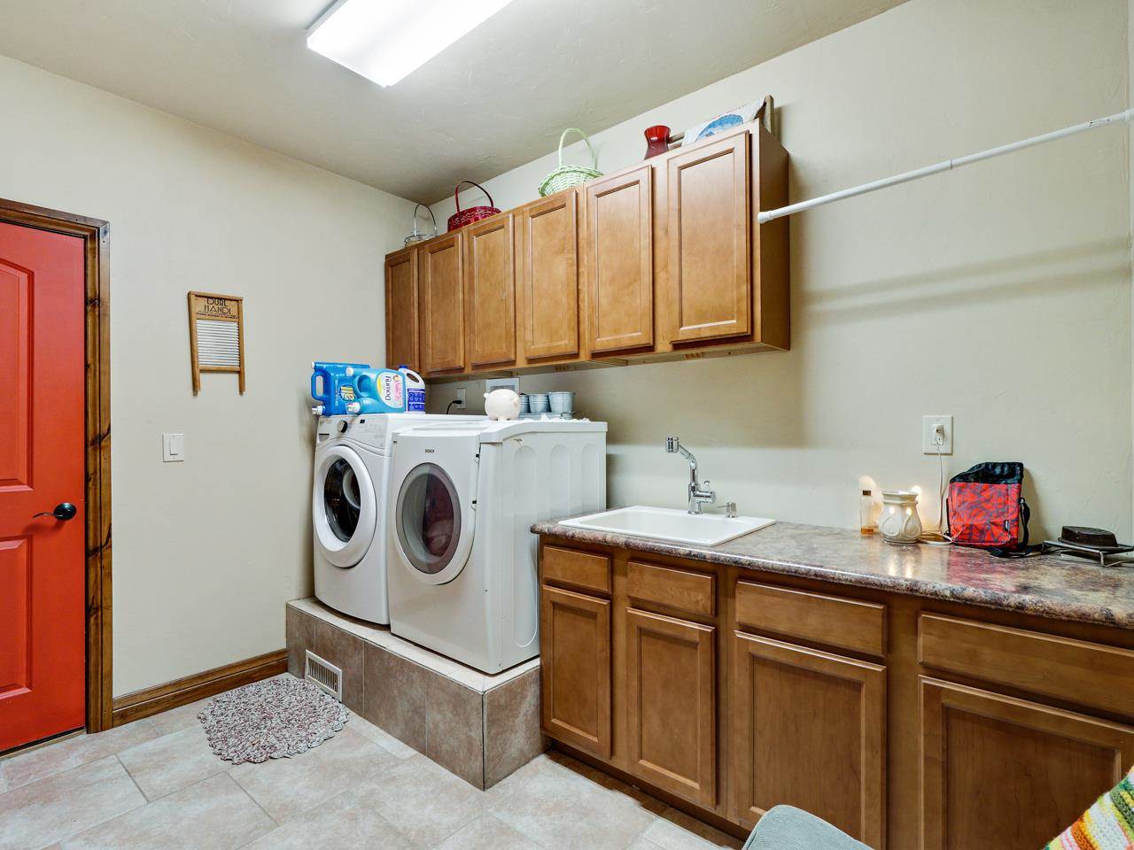 912 23 Road Grand Junction, CO 81505 - Photo 9 of 42 a utility room with sink dryer and washer