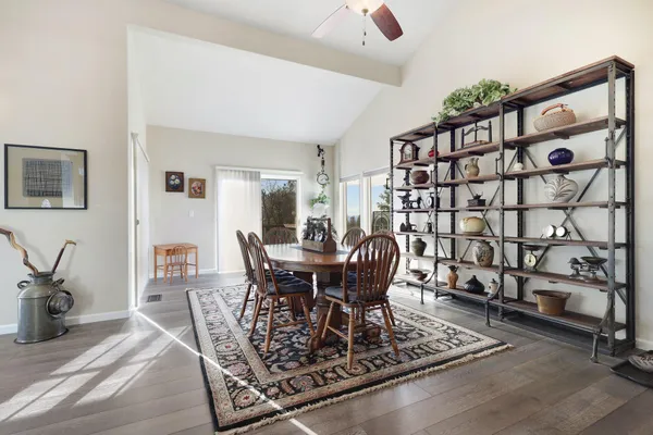 a view of a dining room with furniture