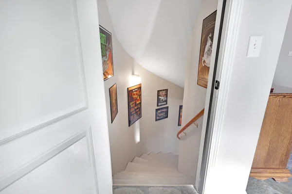 a room with furniture and pool table