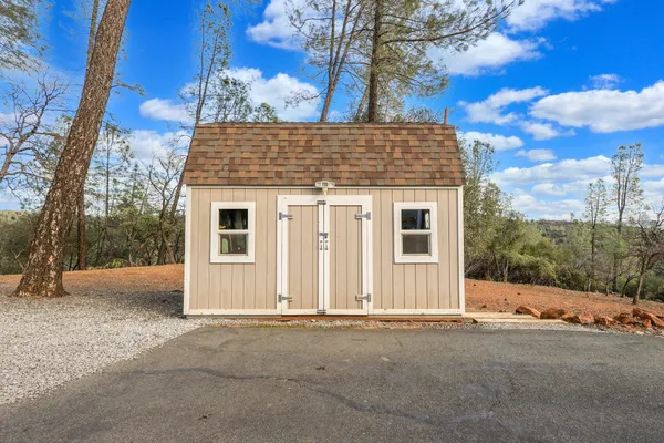 a front view of a house with entertaining space