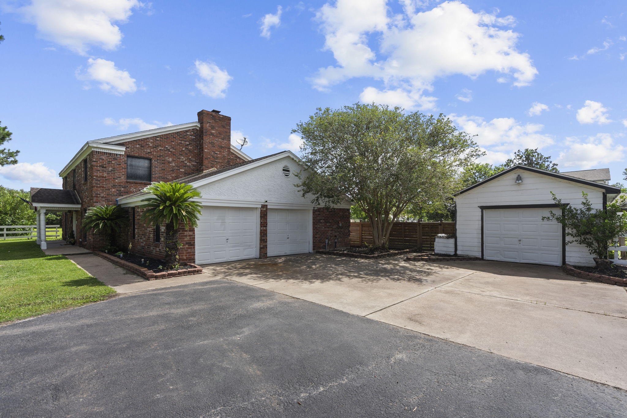7009 Avenue R Santa Fe, TX 77510 - Photo 45 of 48 Attached and detached garages! Lots of parking for all of your toys!