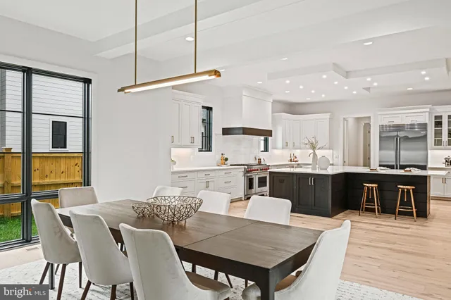 a bedroom with a bed and glass walk in closet