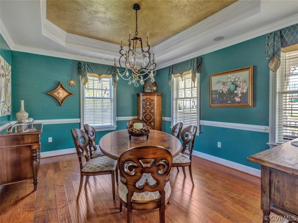 16001 Alsdell Road Midlothian, VA 23112 - Photo 13 of 44 a view of a dining room with furniture window and wooden floor