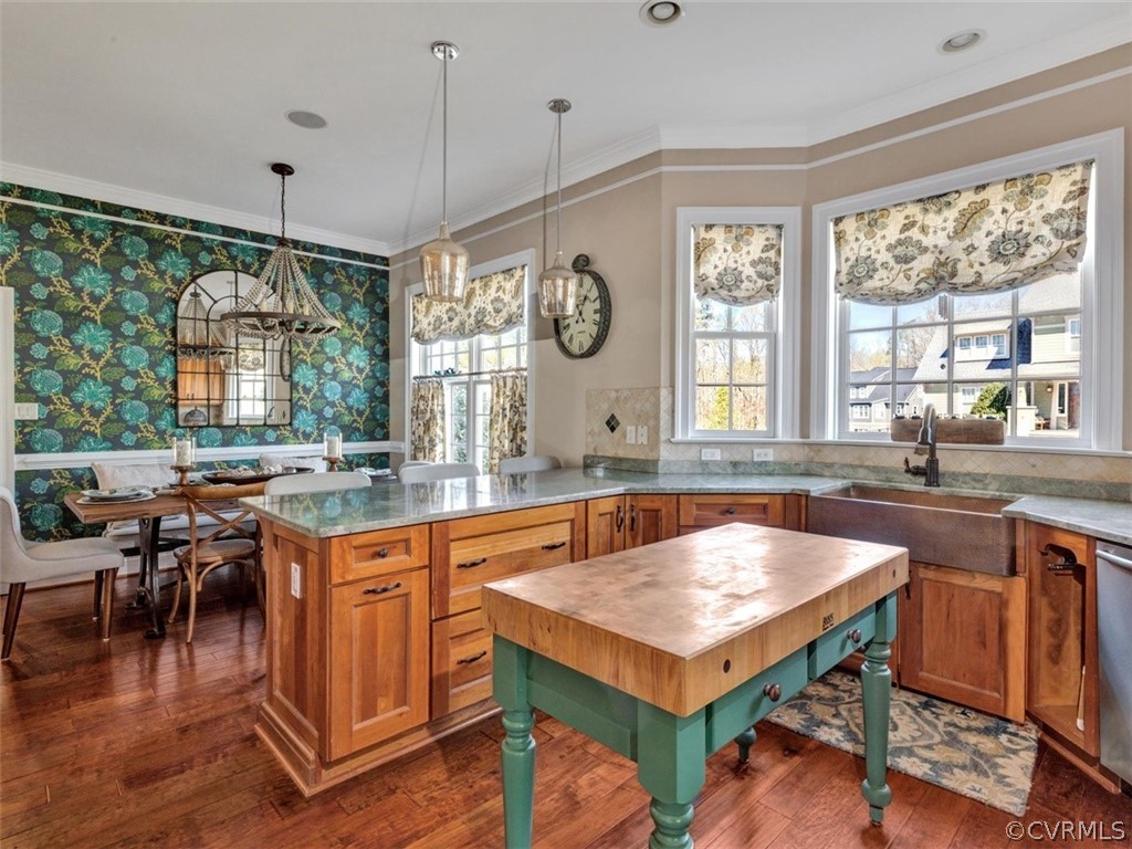 16001 Alsdell Road Midlothian, VA 23112 - Photo 15 of 44 a kitchen with a stove a counter space dining table and chairs
