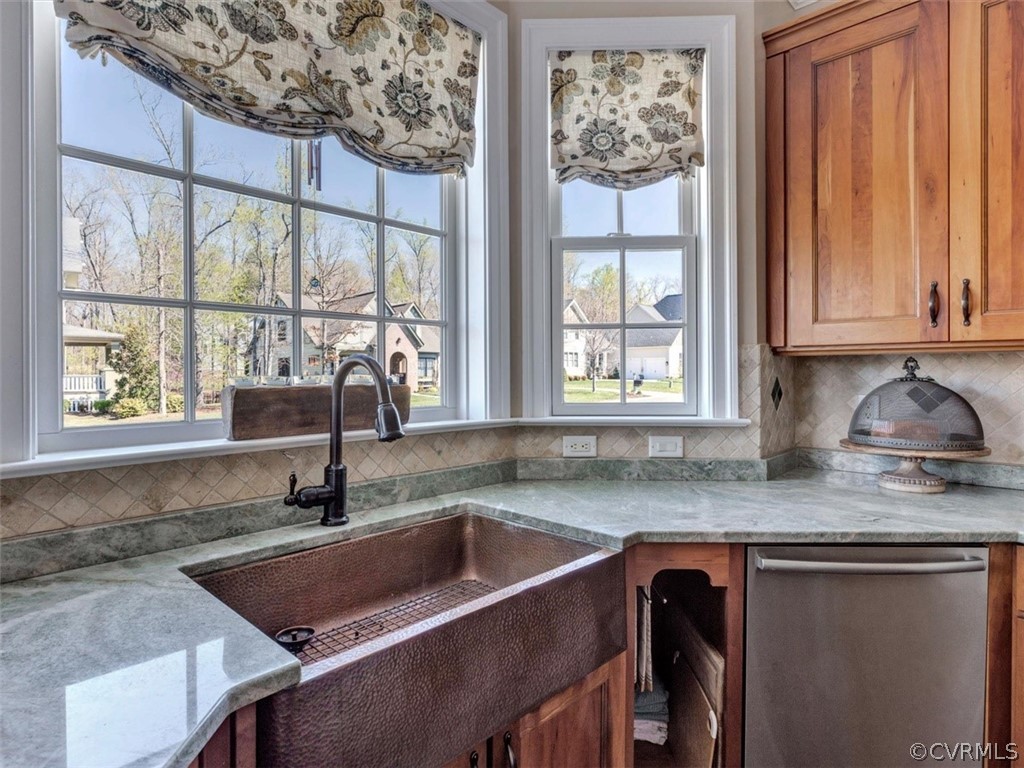 16001 Alsdell Road Midlothian, VA 23112 - Photo 16 of 44 a kitchen with granite countertop a sink window and cabinets