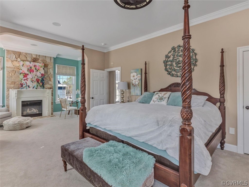 16001 Alsdell Road Midlothian, VA 23112 - Photo 26 of 44 a bedroom with a bed and a fireplace