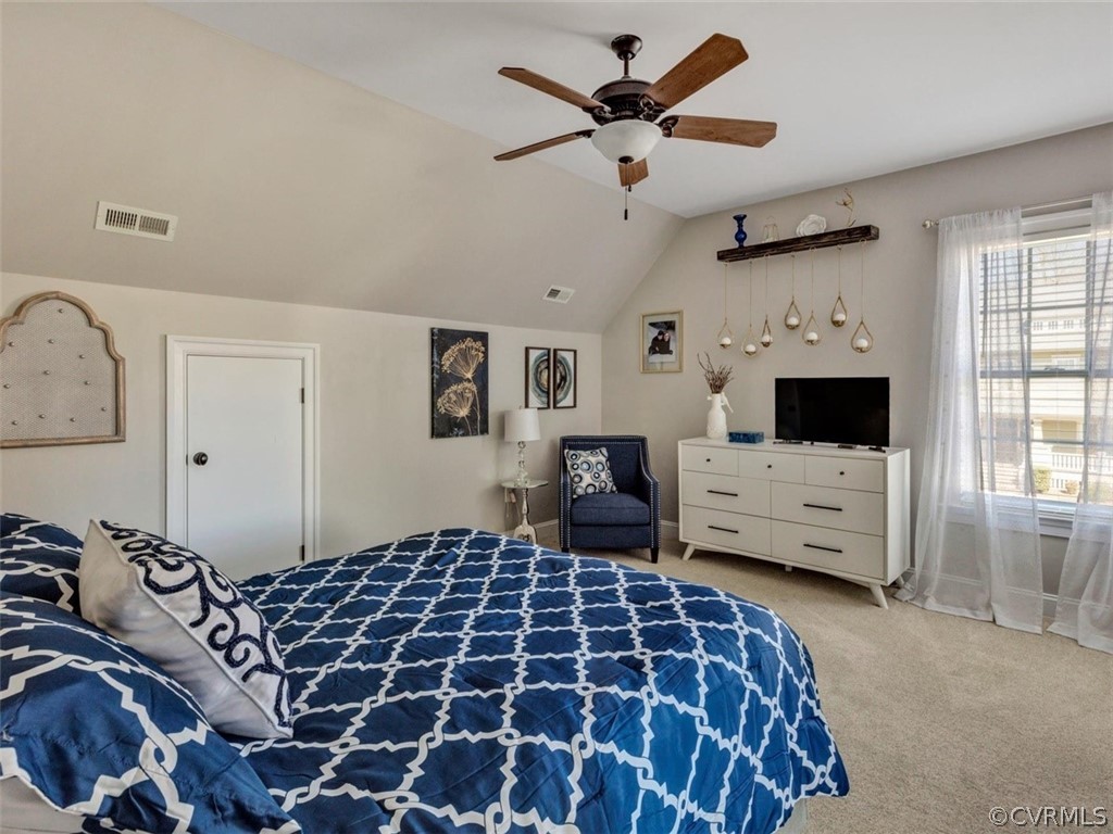 16001 Alsdell Road Midlothian, VA 23112 - Photo 35 of 44 a bedroom with a bed and a flat screen tv