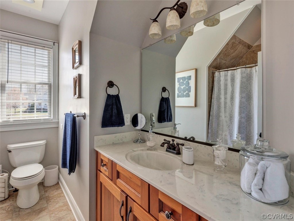 16001 Alsdell Road Midlothian, VA 23112 - Photo 36 of 44 a bathroom with a granite countertop sink toilet and mirror