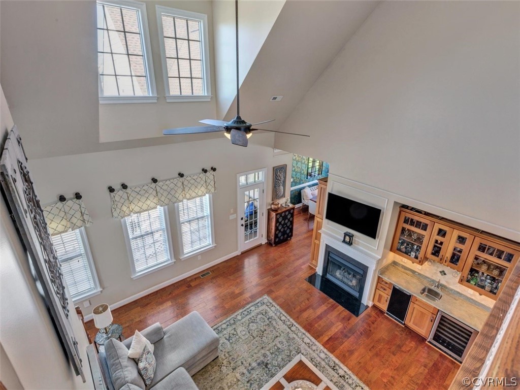 16001 Alsdell Road Midlothian, VA 23112 - Photo 40 of 44 a living room with furniture and a flat screen tv