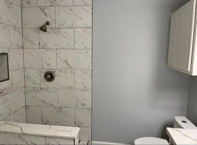 a bathroom with a toilet